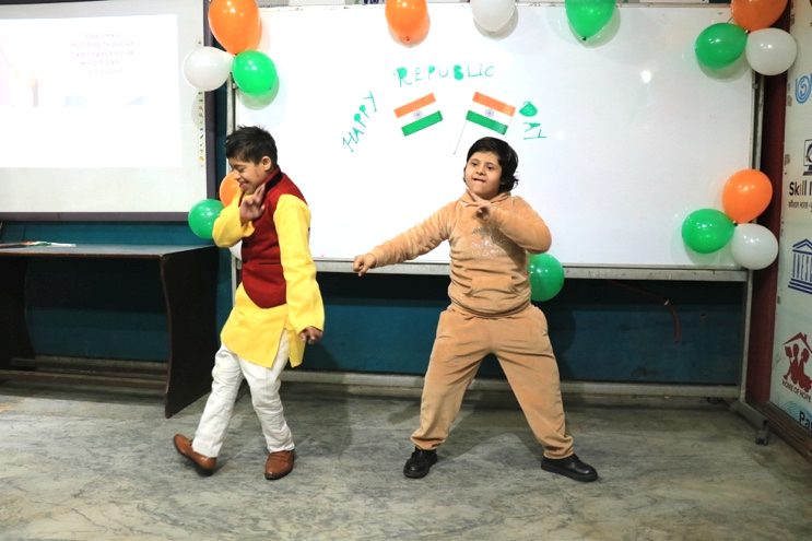 Two A3C children dancing at a Republic Day celebration