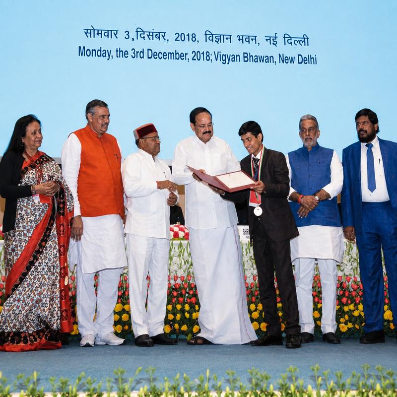 Illustrative portrait of a young man receiving a national award